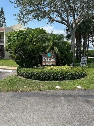 Buy this 2 bed condo on Pineview Road in Jupiter, FL 33469