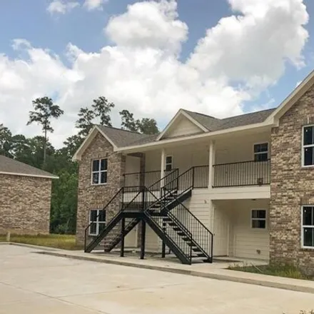 Rent this 2 bed apartment on 1036 Foster Drive in Conroe, TX 77301