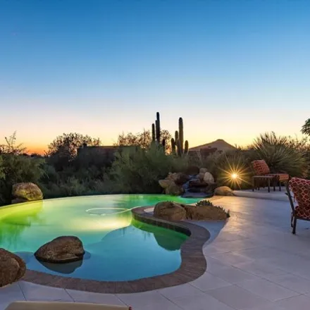 Buy this 4 bed house on 39913 N 105th Way in Scottsdale, Arizona