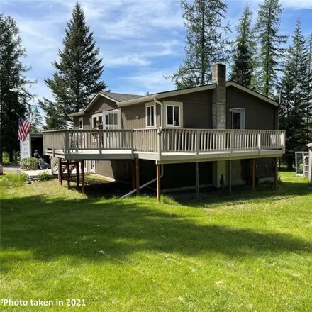 Buy this studio apartment on 205 Beartrap Road in Flathead County, MT 59901
