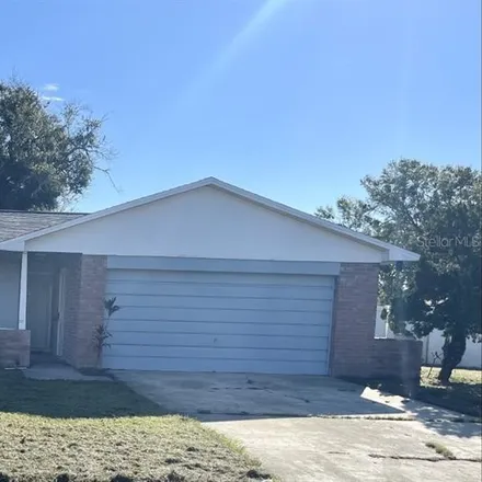Buy this 4 bed house on 3899 Cedarwaxwing Avenue in Orange County, FL 32822