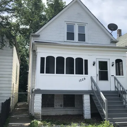 Buy this 3 bed house on 1229 West 74th Street in Chicago, IL 60636