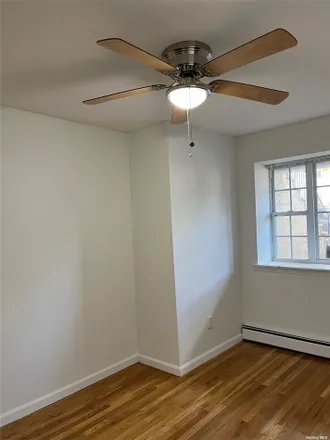 Rent this 2 bed townhouse on 82-83 88th Place in New York, NY 11385