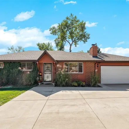 Buy this 4 bed house on 7756 West Chatfield Avenue in Jefferson County, CO 80128