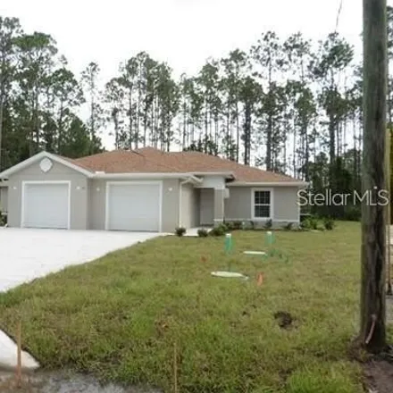 Rent this 3 bed house on 18 Frenora Lane in Palm Coast, FL 32137