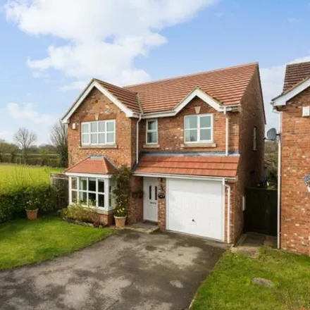 Buy this 4 bed house on Highfield Grove in Bubwith, YO8 6LG