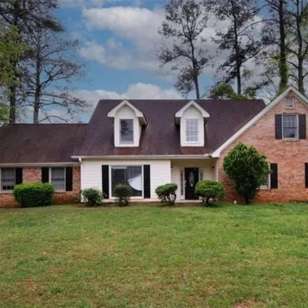 Buy this 4 bed house on 1567 Crooked Tree Lane in Redan, GA 30088