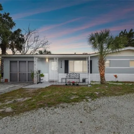 Buy this 3 bed house on 7118 Bougenville Drive in Bayonet Point, FL 34668