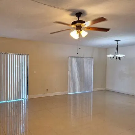 Rent this 2 bed townhouse on 2700 S University Dr Apt 3a in Davie, Florida