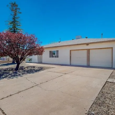 Buy this 3 bed house on 5733 Irving Boulevard Northwest in Albuquerque, NM 87114