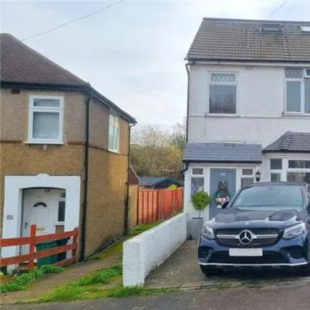 Buy this 4 bed house on 83 Wimborne Avenue in Redhill, RH1 5AH