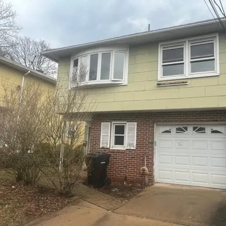 Buy this 4 bed house on 215 South 8th Avenue in Highland Park, NJ 08904