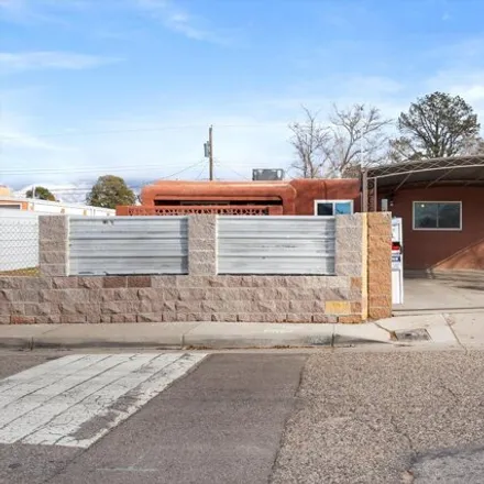 Buy this 5 bed house on 450 Chama Street Northeast in Albuquerque, NM 87108