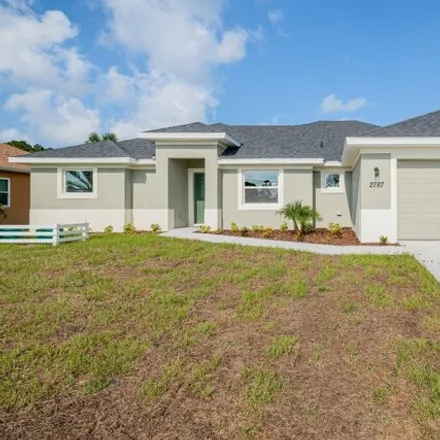 Buy this 4 bed house on 2781 Emerson Drive Southeast in Palm Bay, FL 32909