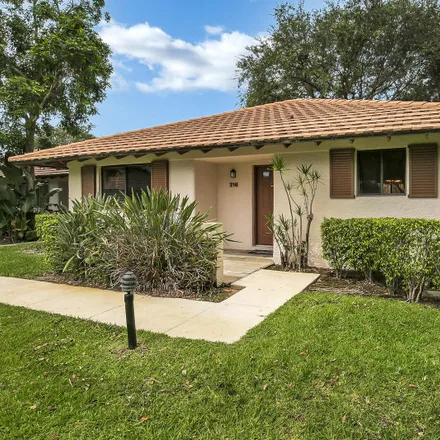 Rent this 2 bed townhouse on 216 Club Drive in Palm Beach Gardens, FL 33418