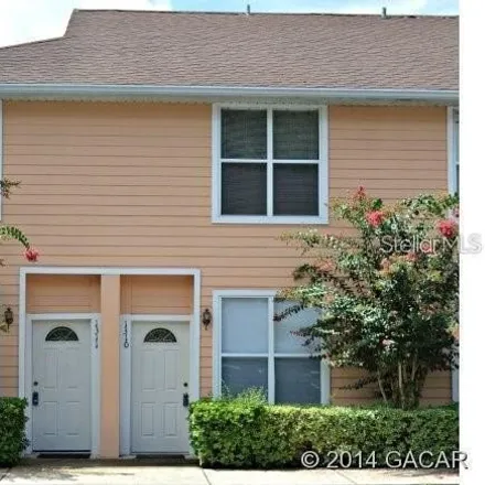 Rent this 2 bed townhouse on Southwest 20th Avenue in Gainesville, FL 32608