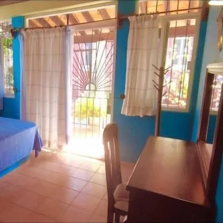 Rent this 3 bed house on Puerto Escondido in San Pedro Mixtepec, Mexico