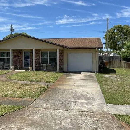 Buy this 3 bed house on 3956 Lejune Avenue in Titusville, FL 32780