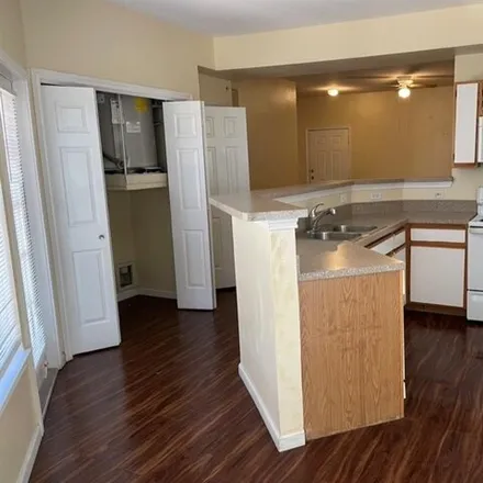 Rent this 2 bed condo on 2320 Gracy Farms Lane in Austin, TX 78758