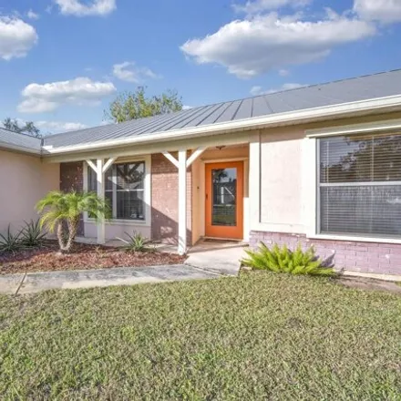 Buy this 3 bed house on 2471 Southeast Tracy Avenue in Port Saint Lucie, FL 34952