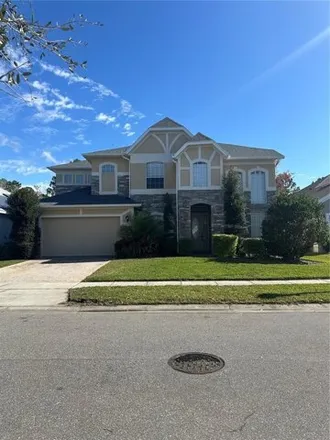 Rent this 5 bed house on 329 Timber Grove Court in Orange County, FL 32828