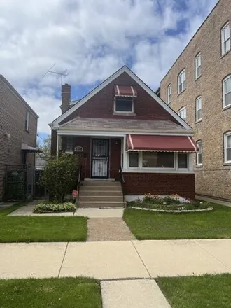 Buy this 3 bed house on 10222 South Prairie Avenue in Chicago, IL 60628