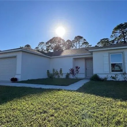 Rent this 3 bed house on De Groodt Road Southwest in Palm Bay, FL 32908