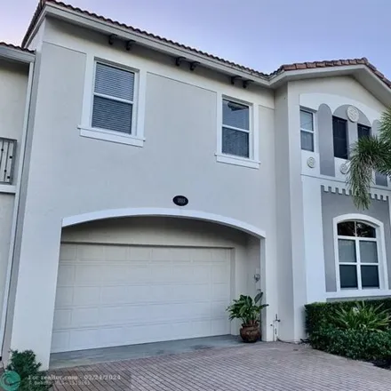 Buy this 4 bed townhouse on Palm Cove Boulevard in Delray Beach, FL 33445