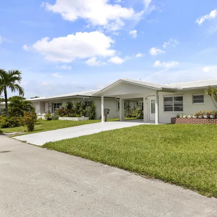 Buy this 2 bed house on 7112 Northwest 66th Terrace in Tamarac, FL 33321