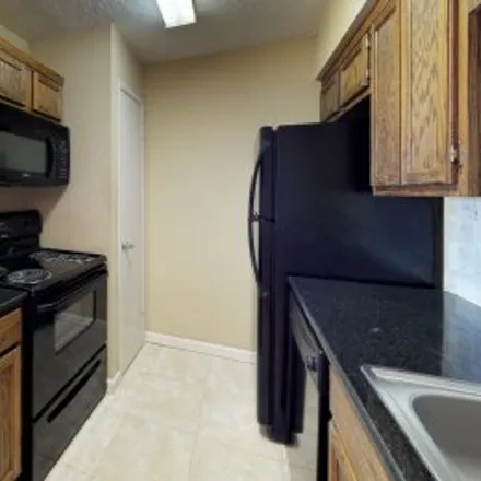 Rent this 1 bed apartment on #36,904 University Oaks Boulevard in Cripple Creek Condominiums, College Station