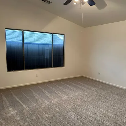 Rent this 3 bed apartment on 12870 West Windrose Drive in El Mirage, AZ 85335