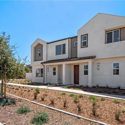 Buy this 3 bed townhouse on Symphony Place in Valencia, CA 91383