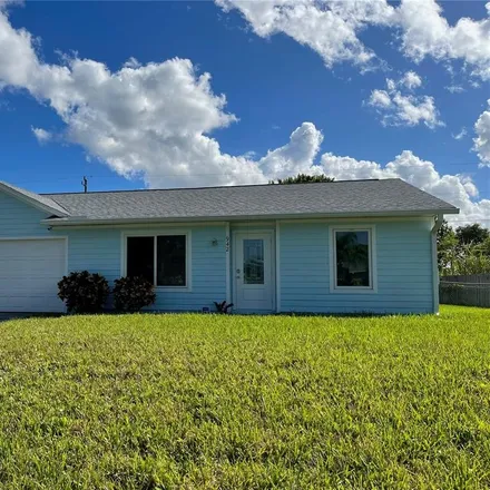 Buy this 3 bed house on 942 Southwest Cornelia Avenue in Port Saint Lucie, FL 34953