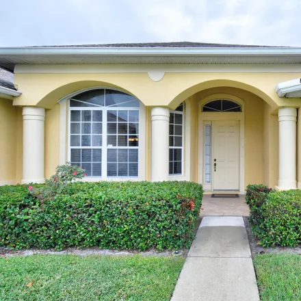 Buy this 4 bed house on 1774 Southwest Commargo Street in Port Saint Lucie, FL 34987