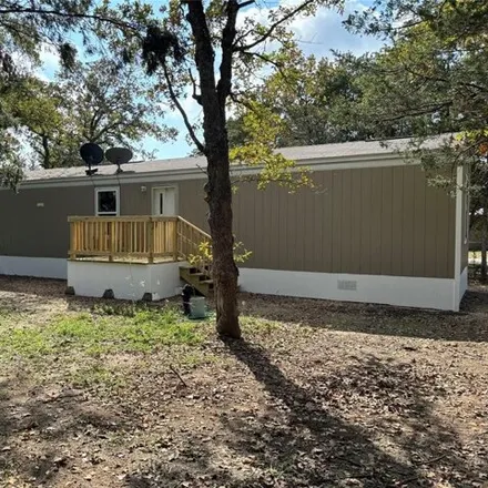 Rent this studio apartment on 303 Lone Star Road in Bastrop County, TX 78602