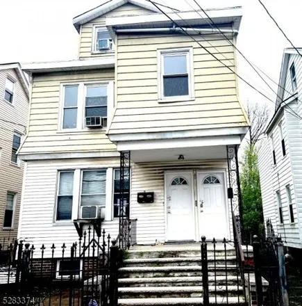 Buy this 5 bed house on 24 Robert Place in Irvington, NJ 07111