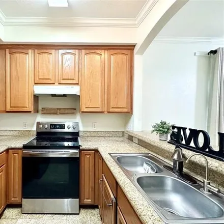 Rent this 3 bed house on 9400 Bellaire Blvd Unit 101 in Houston, Texas