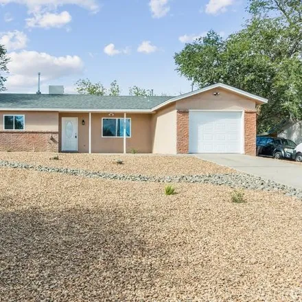 Buy this 3 bed house on 1713 Sunset Road Southeast in Rio Rancho, NM 87124