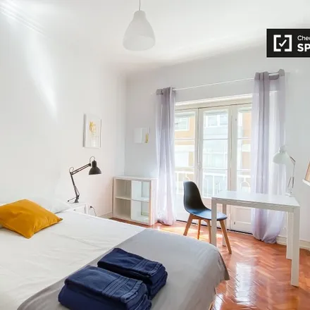 Rent this 3 bed room on Rua de Arroios 89 in 1150-056 Lisbon, Portugal