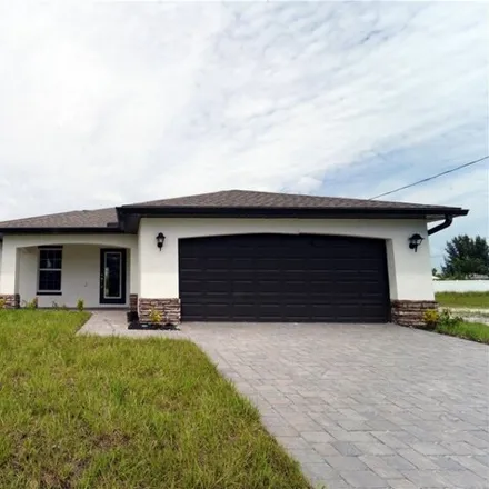 Rent this 3 bed house on 1971 Northwest 14th Terrace in Cape Coral, FL 33993