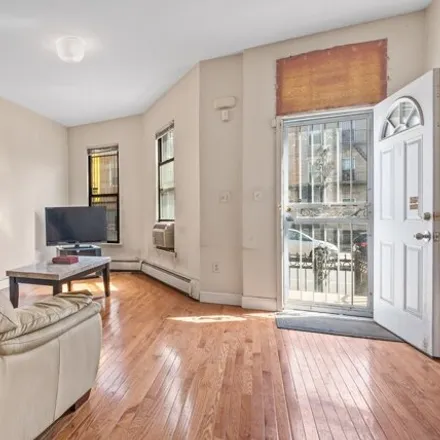 Buy this 2 bed house on 1995 Pacific Street in New York, NY 11233