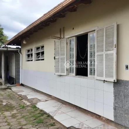 Rent this 3 bed house on Rua do Gramal 313 in Campeche, Florianópolis - SC