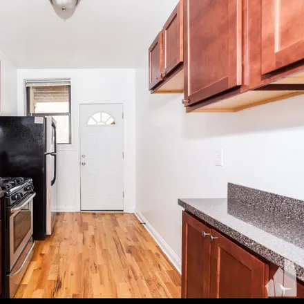 Rent this 3 bed apartment on 813 West Waveland Avenue