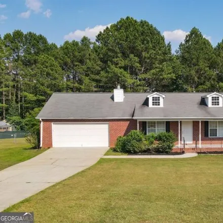 Buy this 3 bed house on 1308 Crumbley Rd in McDonough, Georgia