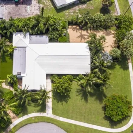 Buy this 4 bed house on 2043 Ascott Rd in North Palm Beach, Florida