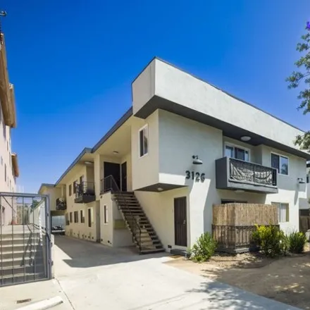 Buy this 11 bed house on 3182 South Canfield Avenue in Los Angeles, CA 90034
