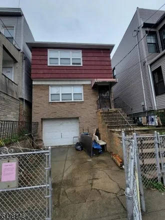 Buy this 4 bed townhouse on 135 Myrtle Avenue in West Bergen, Jersey City