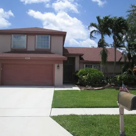 Buy this 4 bed house on 6437 Terra Rosa Circle in Rainbow Lakes, Palm Beach County