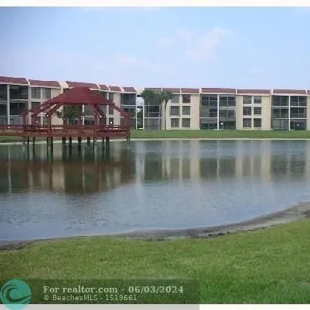 Rent this 2 bed condo on 6696 Coral Lake Drive in Margate, FL 33063