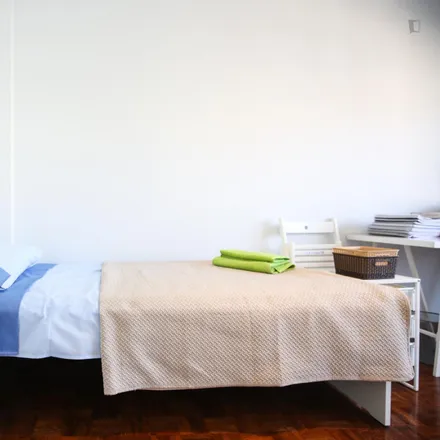 Rent this 4 bed room on Rua da Beneficência in 1600-093 Lisbon, Portugal